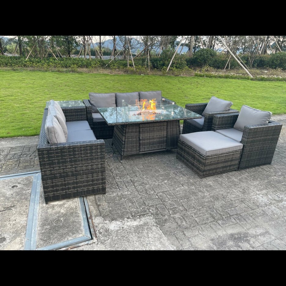 Outdoor rattan garden furniture, gas fireplace, place setting, armchair