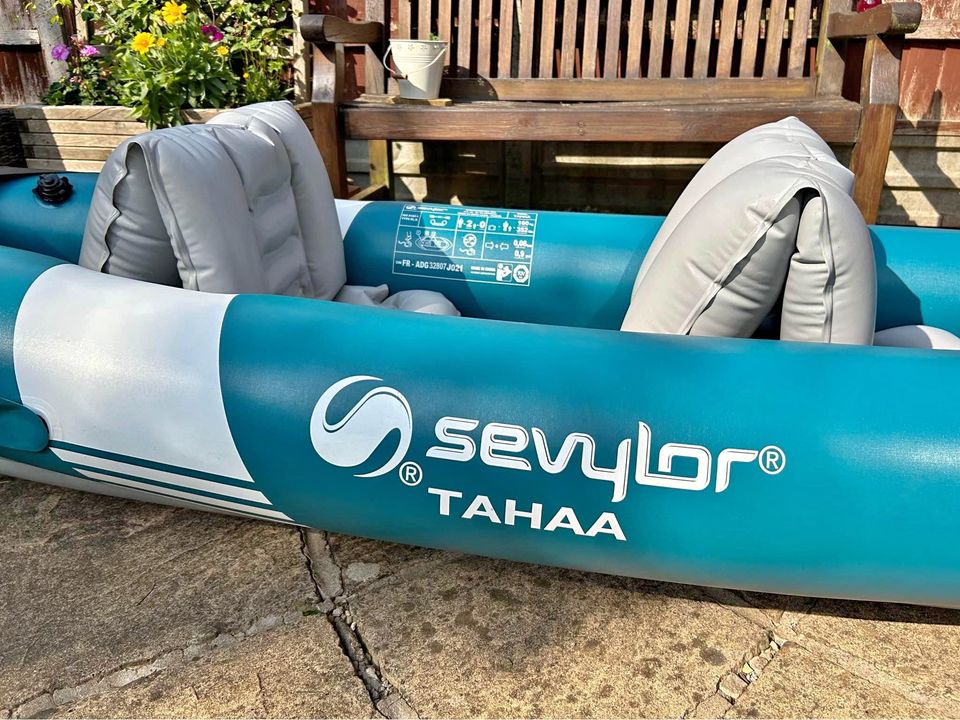 Inflatable double kayak with paddles