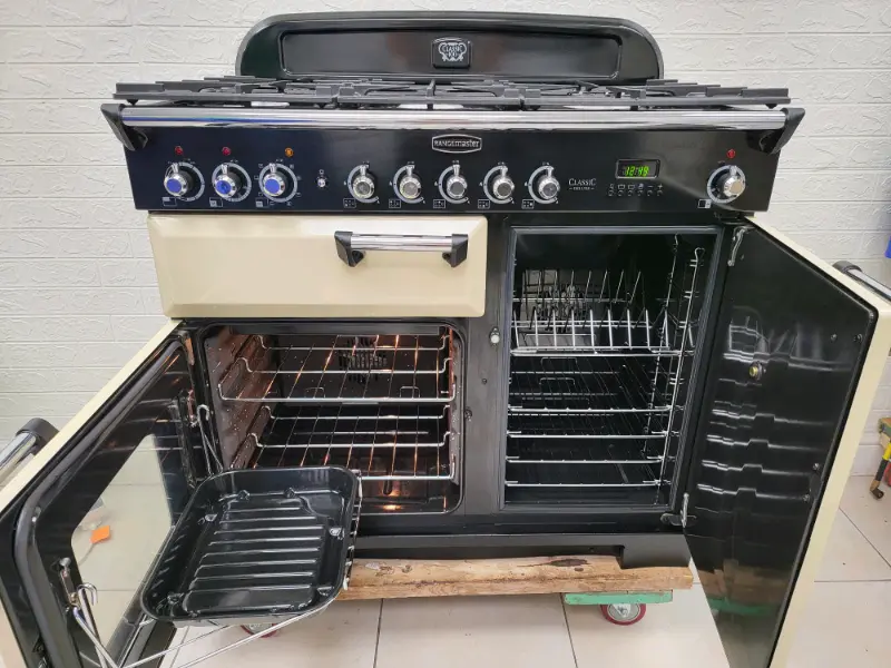 Rangemaster Classic Deluxe Dual Fuel Range Cooker in Cream 100cm