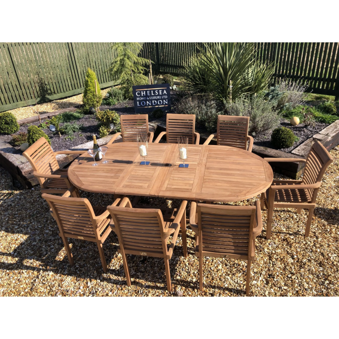 Teak extending table with 8 stacking chairs