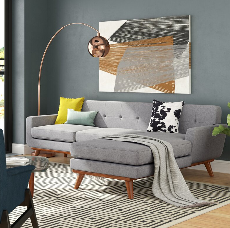 Giuliana 104″ Wide Faux Leather Reversible Sofa & Chaise with Ottoman